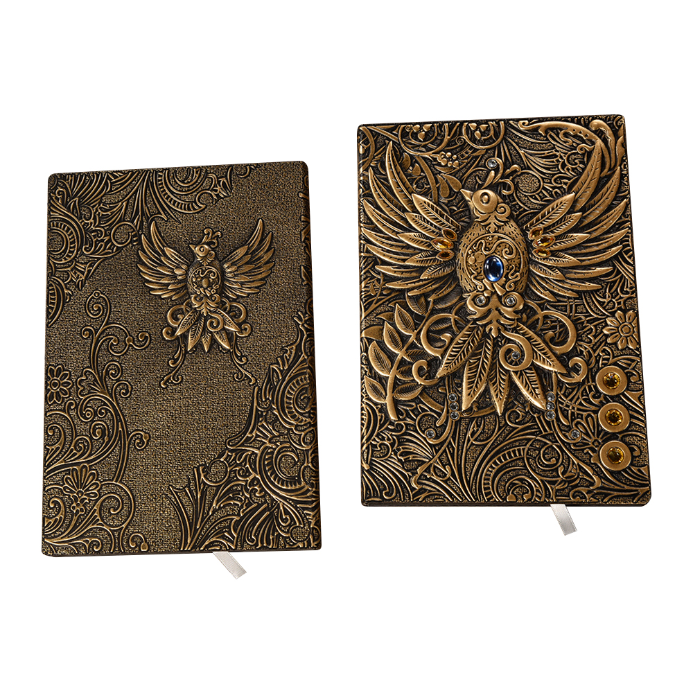 Carnet grimoire phénix finition bronze — vue de la couverture et du dos