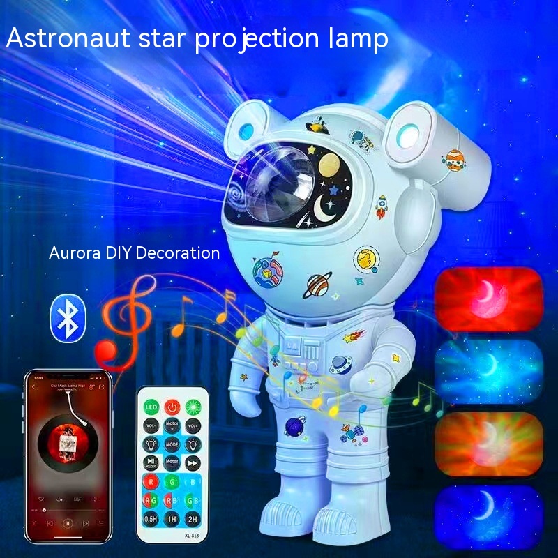 Projecteur astronaute Aurora qui projette nébuleuses et galaxies avec enceinte Bluetooth — cabinet de curiosités Curiosa